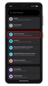 Access more settings by tapping on the Security and privacy section. Settings menu on an Android device with a focus on Security u0026 privacy section.