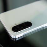 If you choose one of the cheaper models, you will have to make compromises when it comes to the ultrawide-angle or macro camera. A Samsung Galaxy A56 smartphone lies on a glass surface and shows its camera module and design.