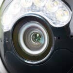 Thanks to a high-speed lens, the Atlas PT Ultra does not need infrared lights for night vision. Close up of the Reolink Atlas PT Ultra security camera lens and its LED lights.