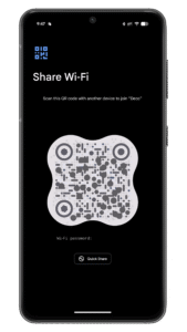 Use the camera of the other phone to connect to the Wi-Fi in the QR code. A smartphone screen displaying a QR code to share Wi-Fi. Text prompts to scan the code for network access.