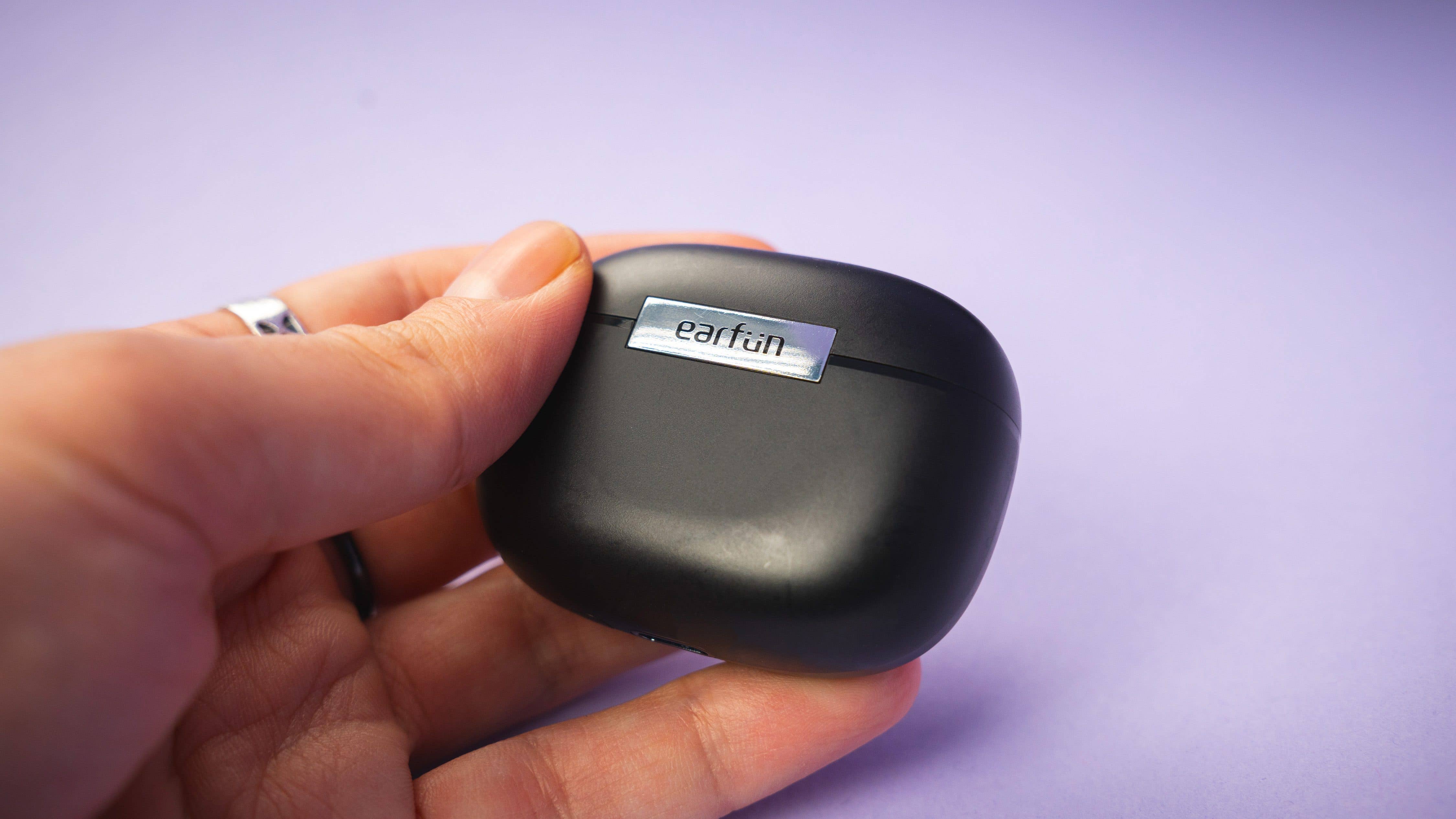 The EarFun Air 2 case features its brand prominently.