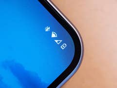 Close-up of a Google Pixel 9 phone screen displaying status icons.