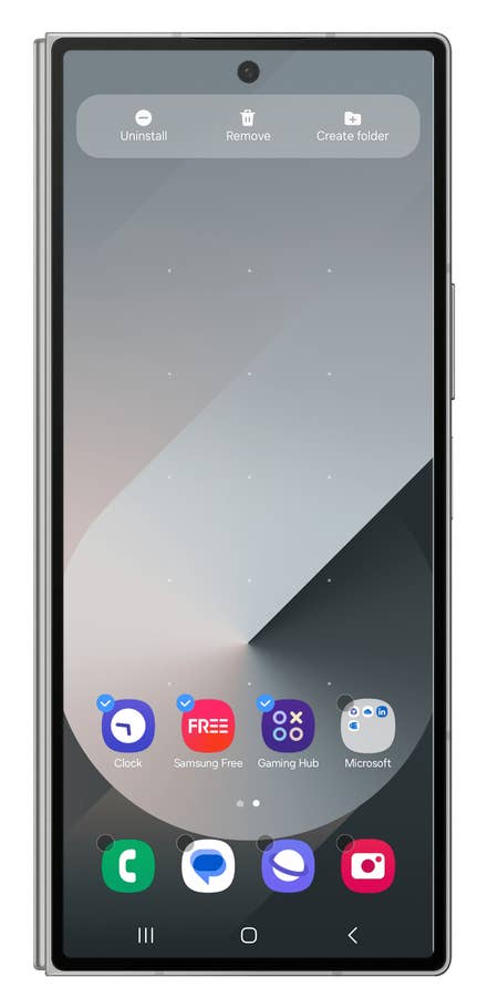 One UI screenshots showing how to move (or remove) multiple apps from the home screen.