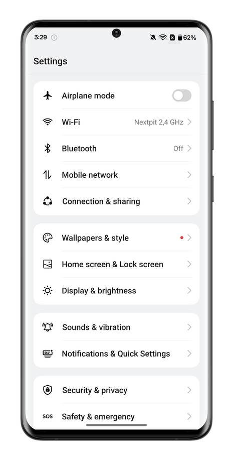 Settings menu displayed on a OnePlus smartphone, showing options like Wi-Fi, Bluetooth, and Display brightness.