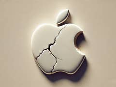 Cracked apple logo on a beige background.