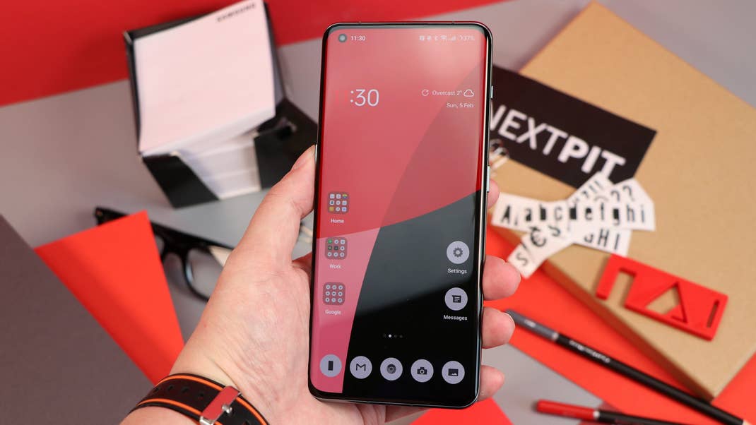 A person holding the OnePlus 11 5G