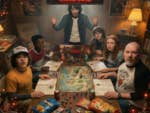 The Stranger Things heroes sit together with a man in the basement and play Dungeons and Dragons.