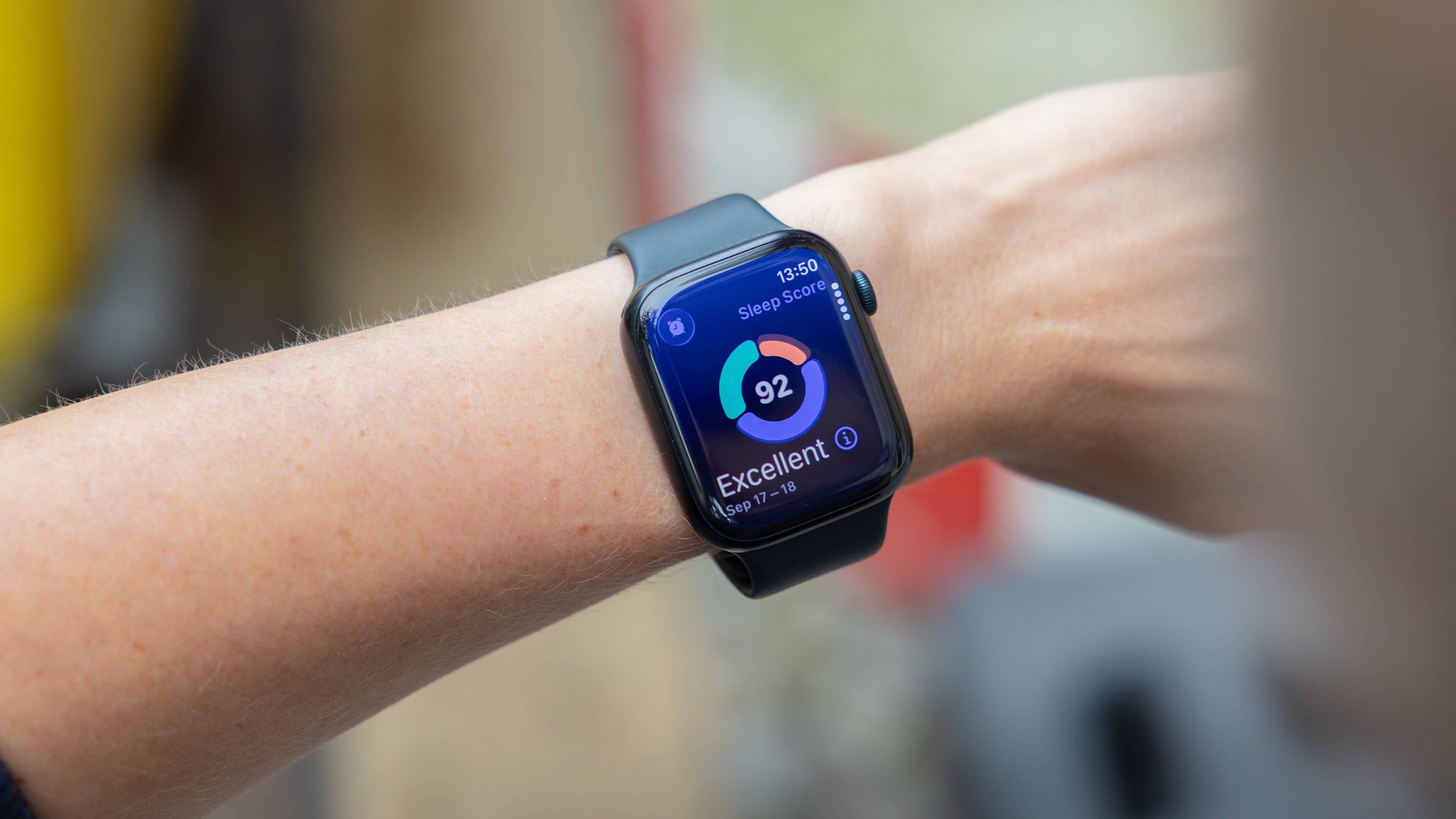 A close-up of a smartwatch displaying a sleep score of 92, labeled 'Excellent'.