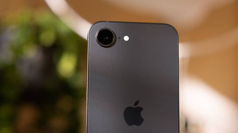 Close-up of an Apple iPhone 16e showing the rear camera and Apple logo.