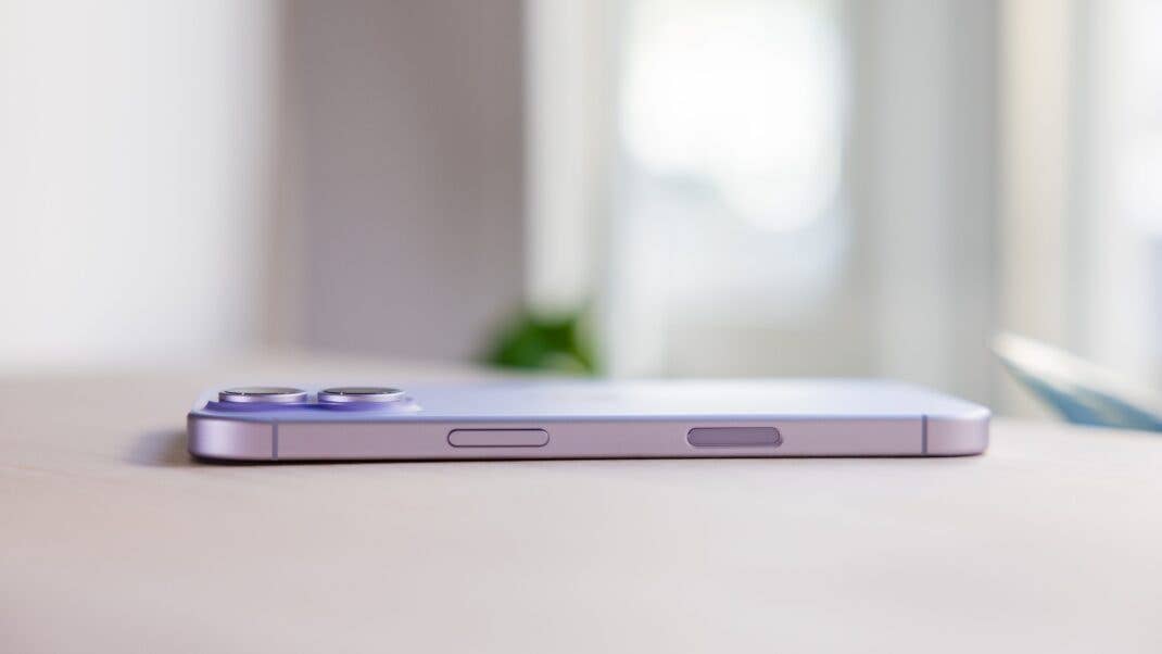 Side view of an Apple iPhone 17, showcasing its sleek design and dual camera setup.