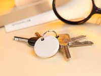 Chipolo One Point item tracker on a keyring.