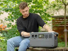 A person with the DJI Power 1000 power station