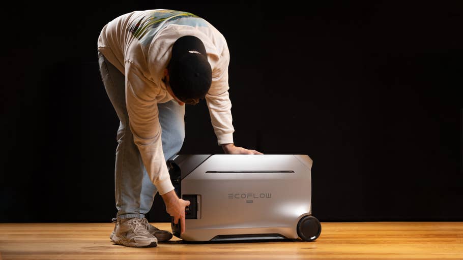 Person adjusting the EcoFlow Delta Pro 3 portable power station.