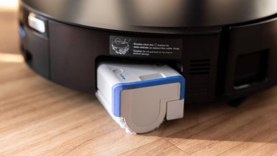 Close up of the Ecovacs Deebot X8 Pro Omni with the roller mop retracted.