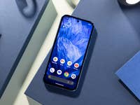 Google Pixel 8a viewed from the front showing the default home screen