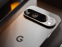 The Google Pixel 9 Pro XL seen from the back with a zoom on its photo module.