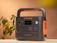 Jackery Explorer 1000 portable power station with various ports and a digital display.