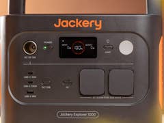 Jackery Explorer 1000 power station with various input/output ports and digital display.