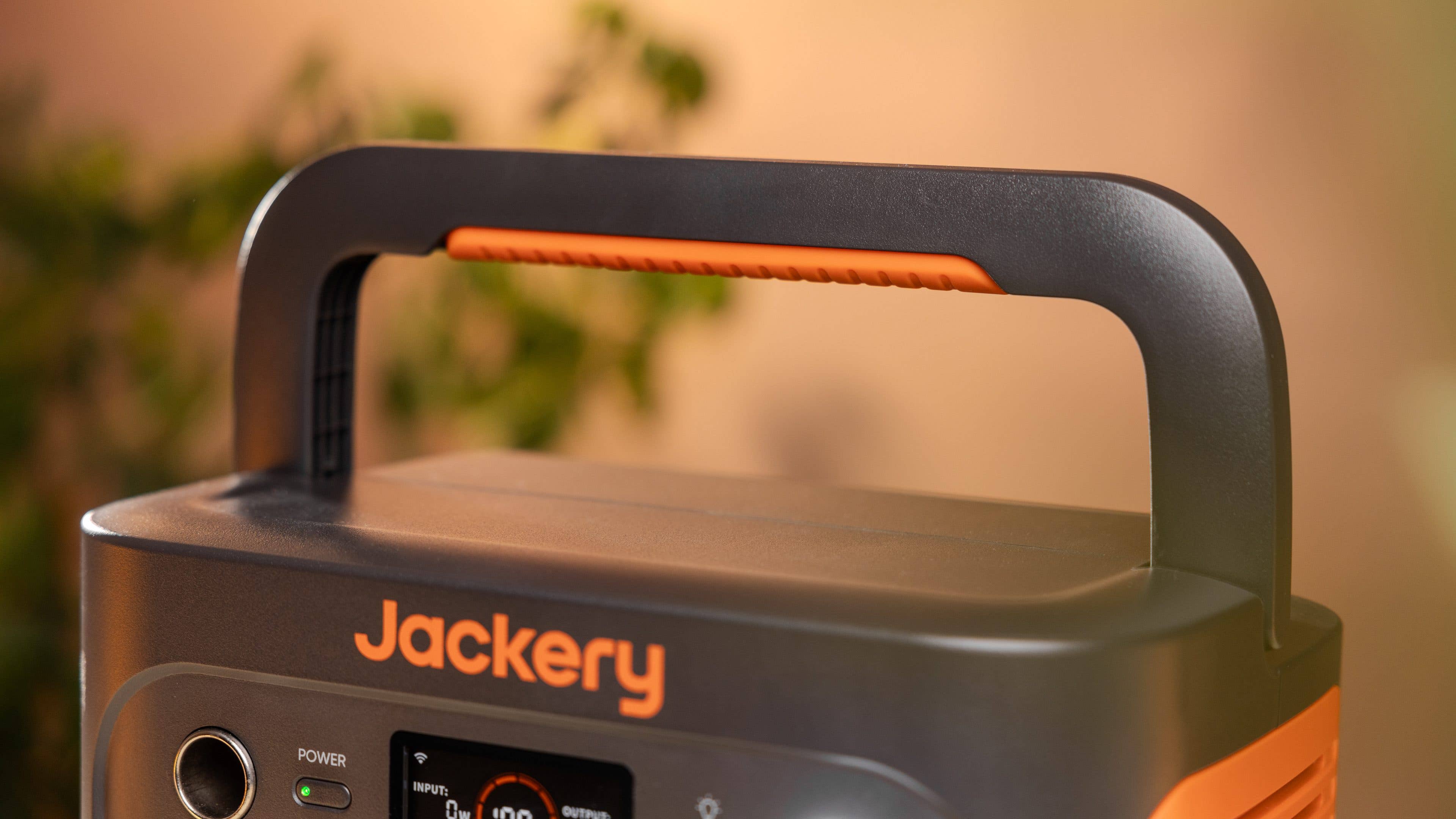 Jackery Explorer 1000 V2 portable power station with a handle and control panel.