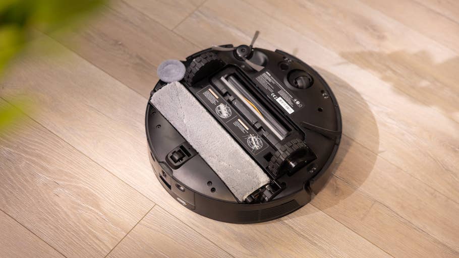 A view of the Mova Z50 Ultra robotic vacuum cleaner from above, showing its brush and cleaning components.