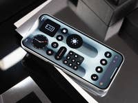 A Nothing Phone 2A Plus displaying a sleek interface with various app icons on a reflective surface.