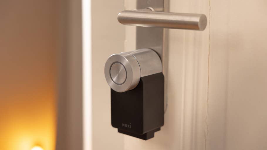 Close-up of a Nuki Smart Lock Pro installed on a door.