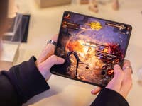 A person playing Diable Immortal on the OnePlus Open main display