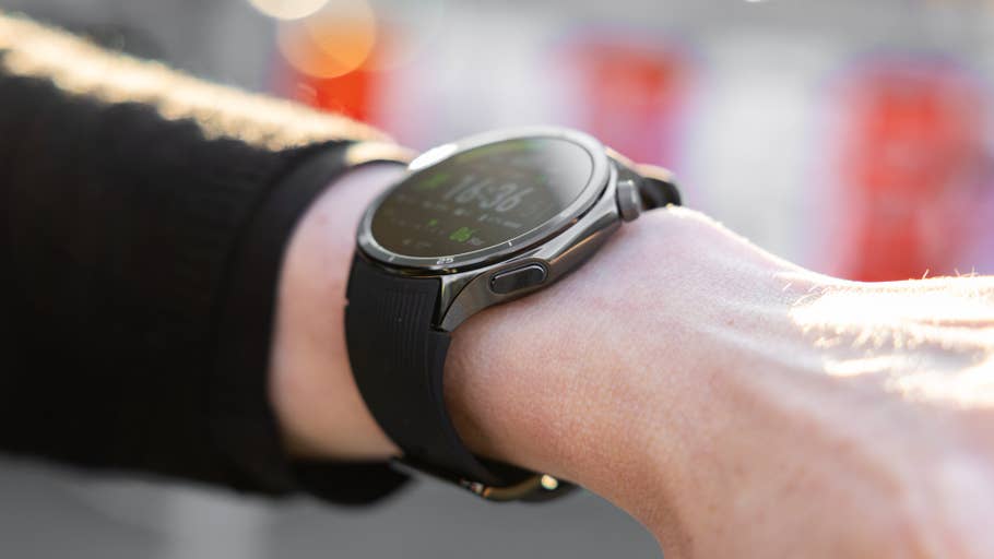 A close-up of a OnePlus Watch 3 on a wrist, displaying various fitness metrics.