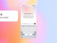 A mobile phone displaying GPT-5 introduction text with a colorful background.