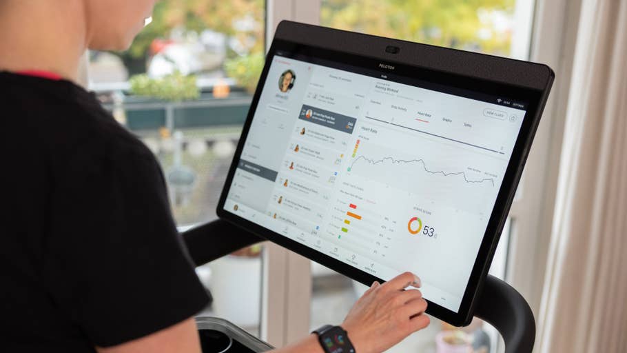A person looking at the heart rate data on the Peloton Tread Tablet