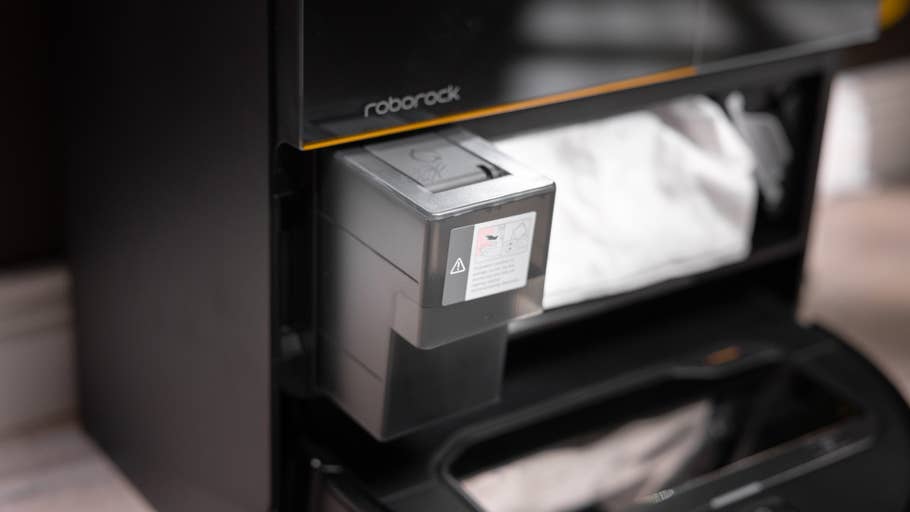 Close-up of a Roborock Saros Z70u0027s docking station with its dust bin.