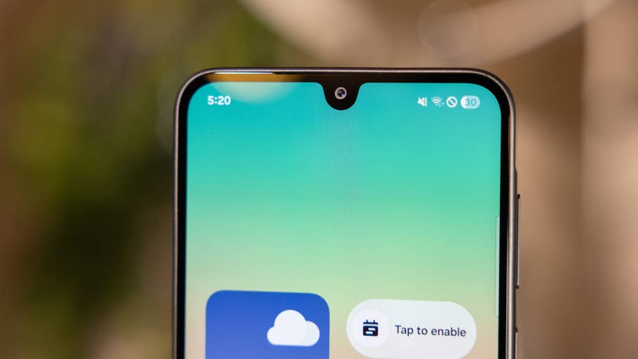 Close-up of a Samsung Galaxy A26 smartphone screen showing the time 5:20 and app icons.
