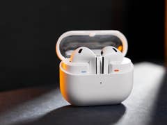 Samsung Galaxy Buds 3 in charging case with earbuds visible.