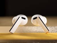 The Samsung Galaxy Buds 3 Pro seen from the front and placed vertically next to each other.