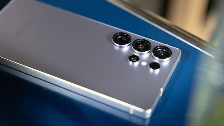 Close-up of the back of a Samsung Galaxy S25 Ultra smartphone showing its camera lenses.