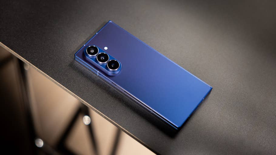 A Samsung Galaxy Z Fold7 smartphone in blue color on a dark surface.