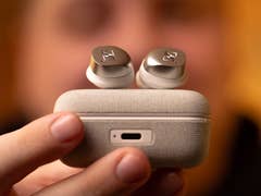 Sennheiser Momentum True Wireless 4 earbuds on top of the charging case