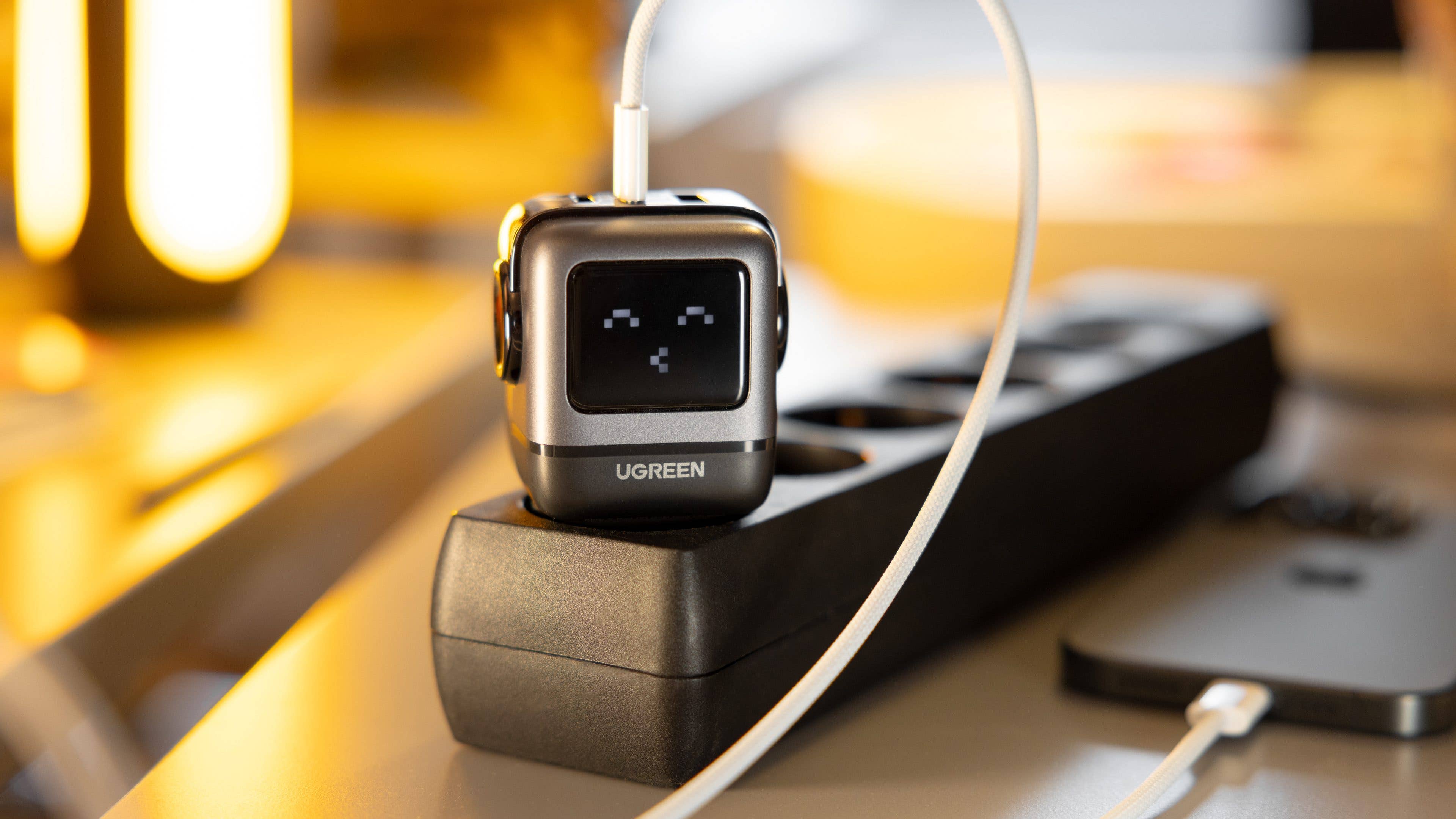 The Ugreen Nexode Robot GaN charger is in its happy place whenever it charges a device. The Ugreen Nexode Robot GaN charger is in its happy place whenever it charges a device.