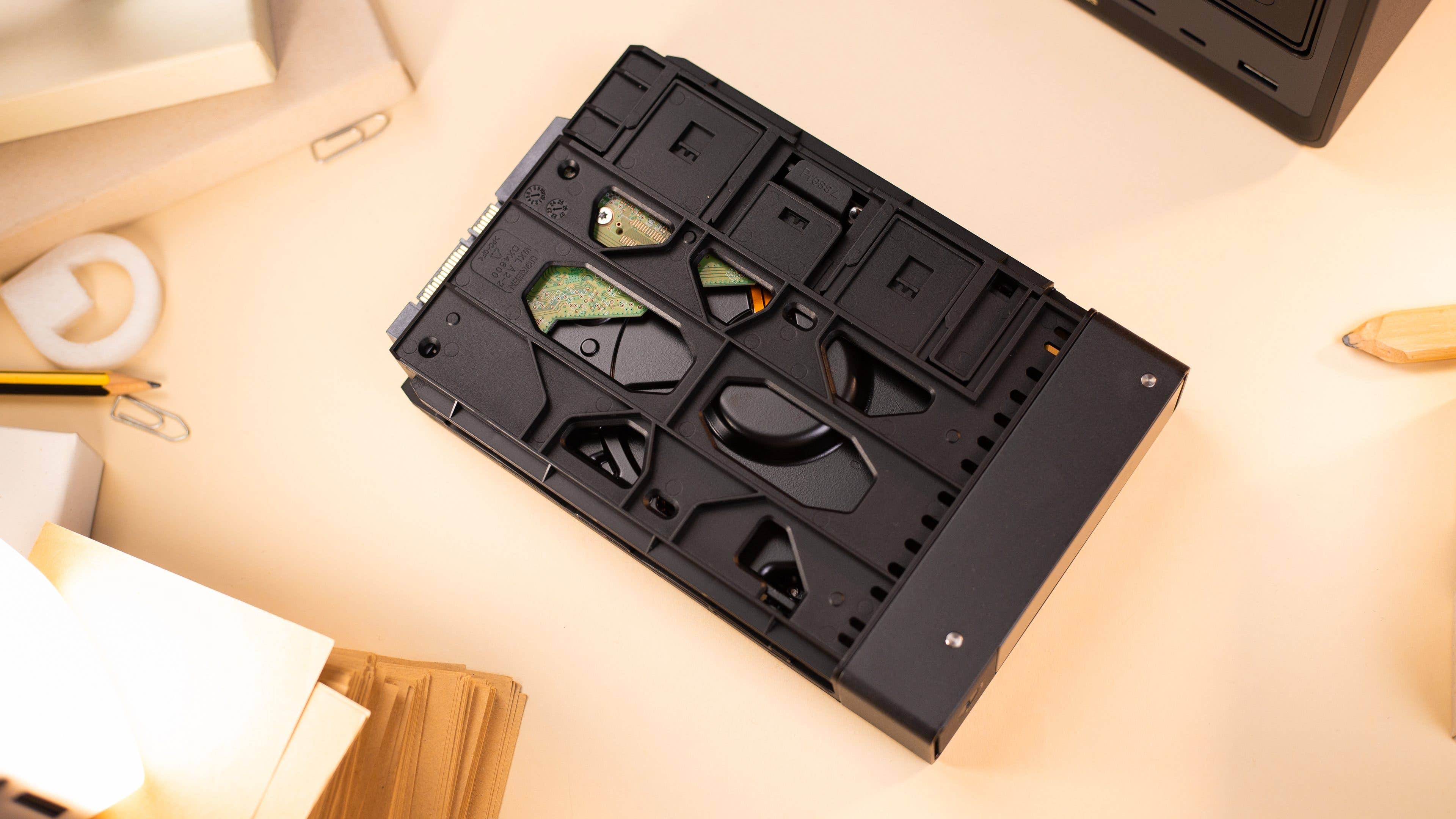 UGreen DXP4800 Plus drive tray with an 3.5-inch HDD installed.