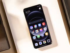 Xiaomi 14 Ultra seen from above with its AMOLED screen switched on