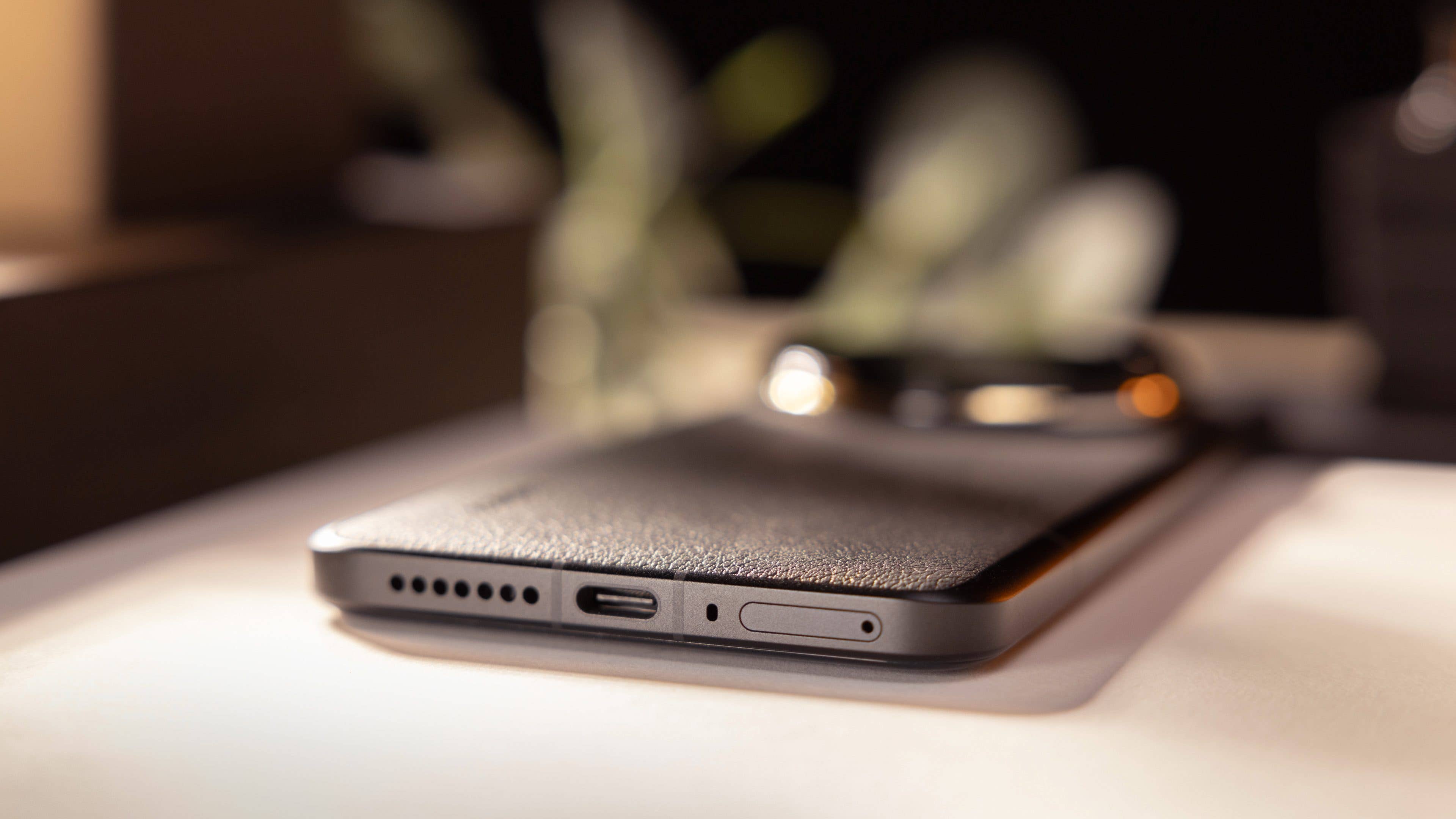 The Xiaomi 14 Ultra laid flat with its photo module raised in relief