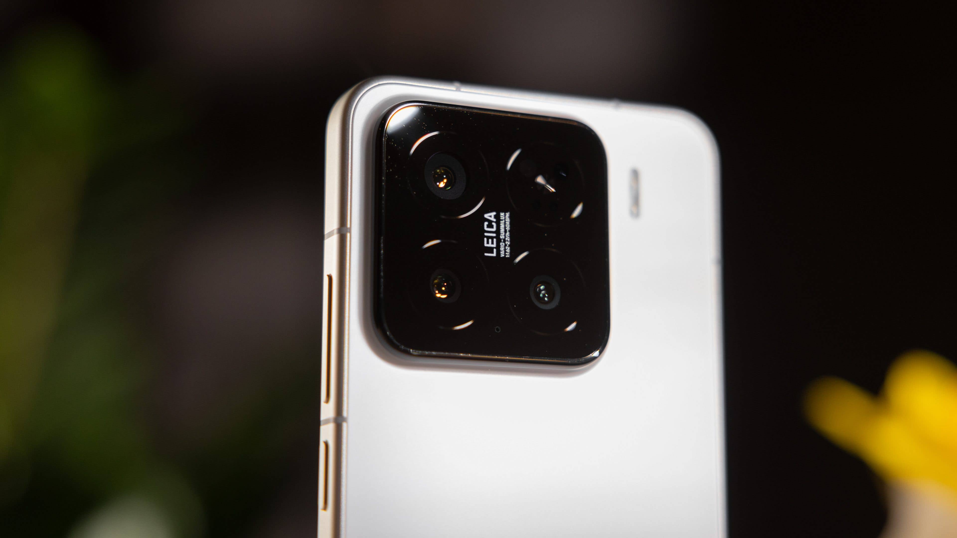 Close-up of a Xiaomi 15 smartphone featuring a Leica camera module.