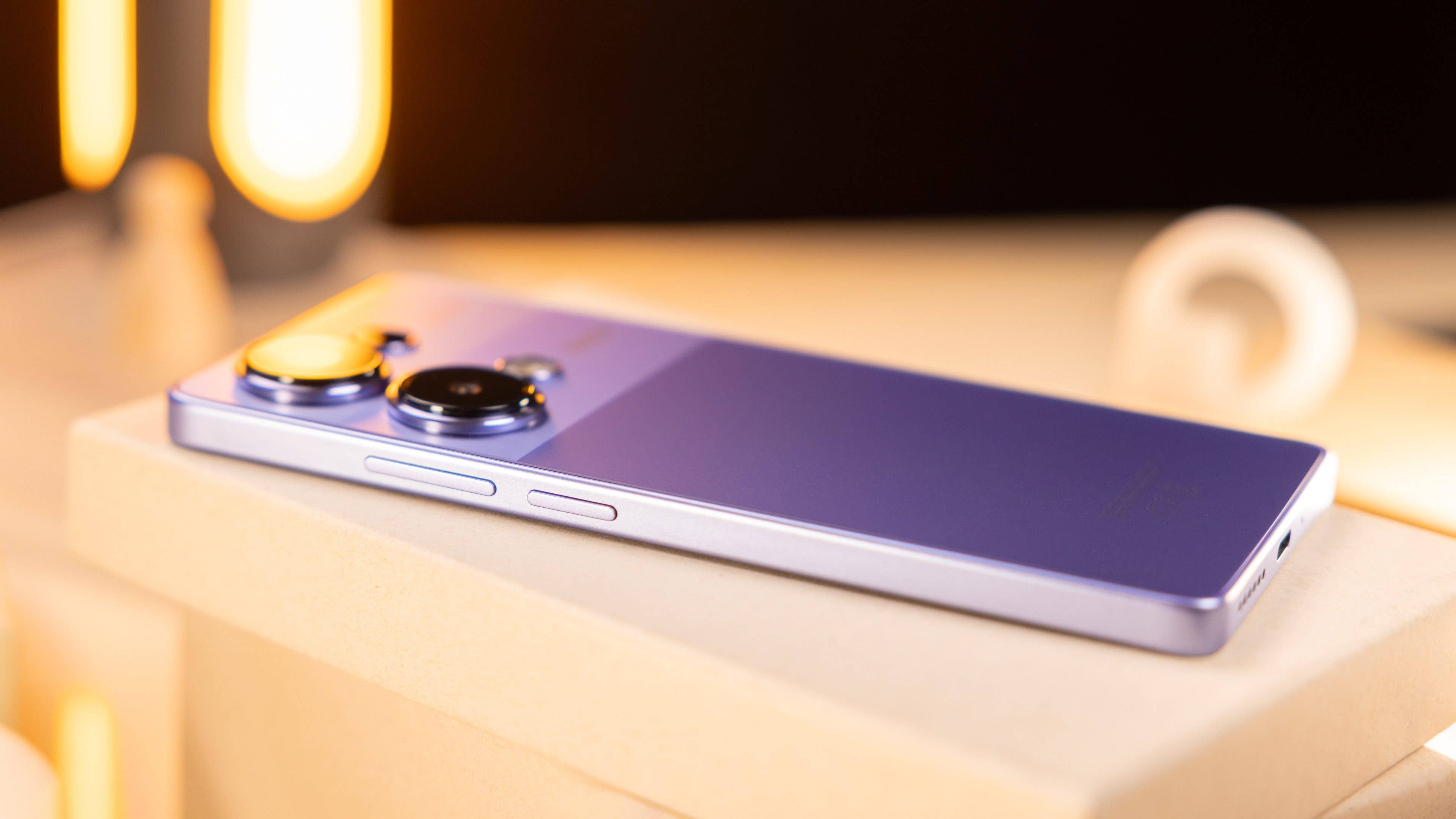 Redmi Note 13 Pro 4G viewed from the side showing the volume and power buttons on the phone's right side.