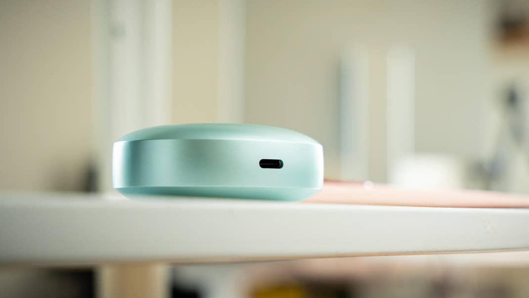 A close-up of the OnePlus Buds 4 charging case, showcasing the USB-C port.