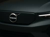 Volvo logo on an electric vehicle A close-up view of Volvo logo on an electric vehicle/car.