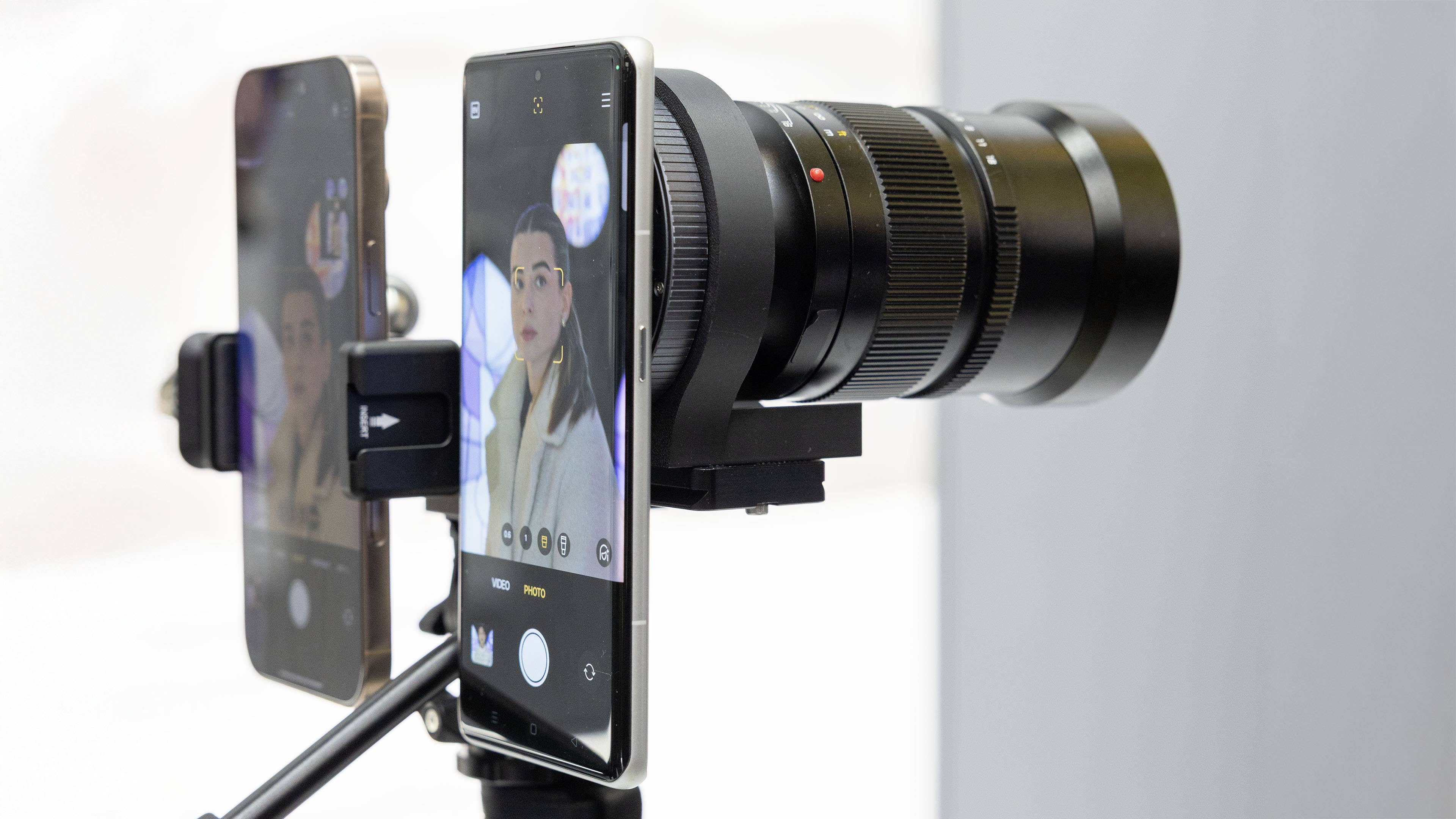 Concept phone with Leica M lens mount, showcasing two smartphones connected for photography.