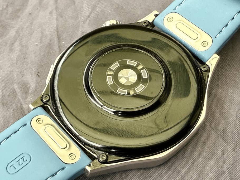 Close-up of the back of a Huawei Watch GT 5 with a blue strap.
