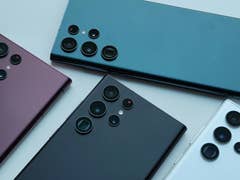 Several Samsung smartphones lying on a table