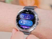 Samsung Galaxy Watch 8 Classic displaying health stats: steps, calories, and energy score.