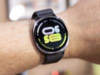 A Samsung Galaxy Watch 8 displaying the time 06:58 with a black strap.